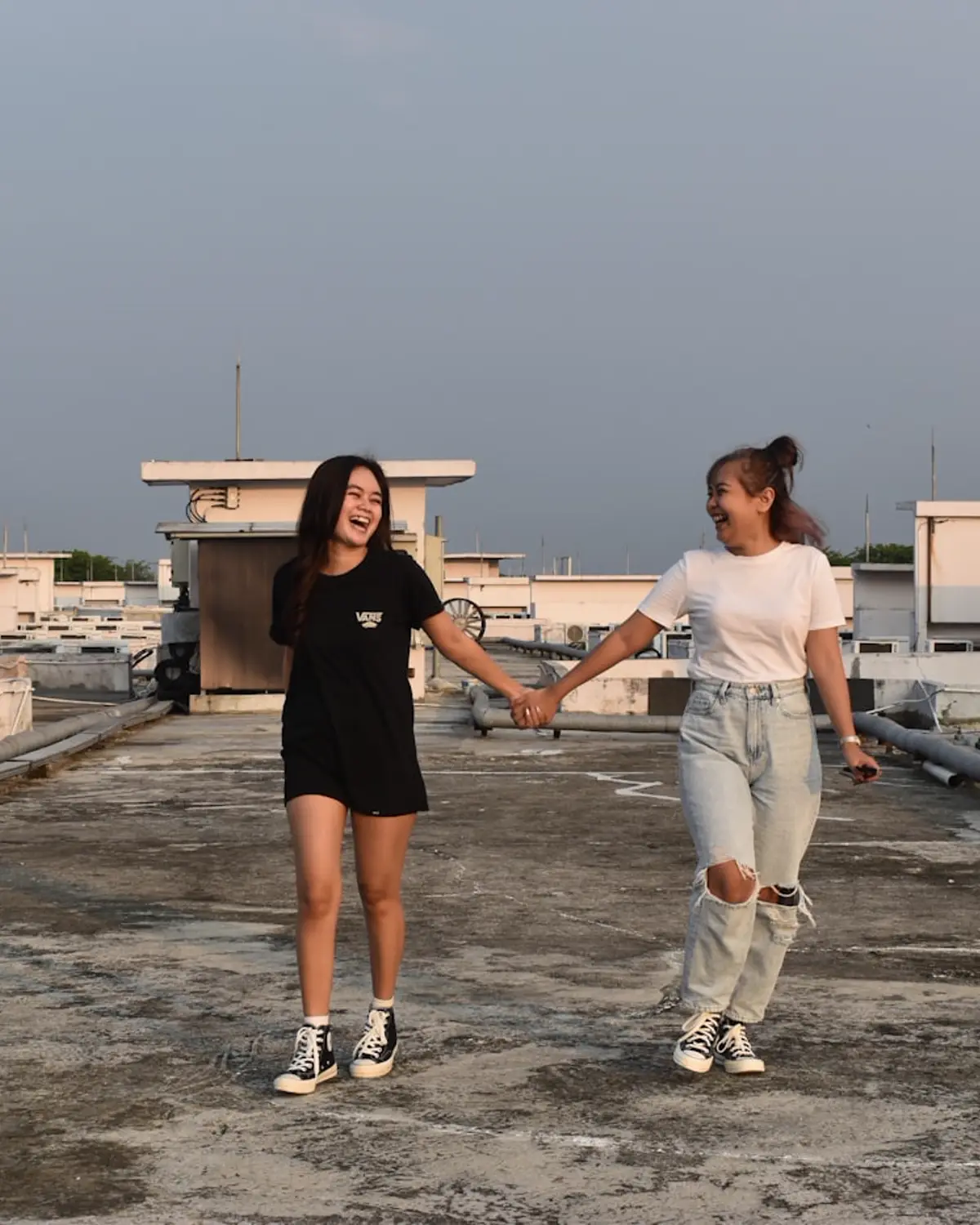 Two friends laughing